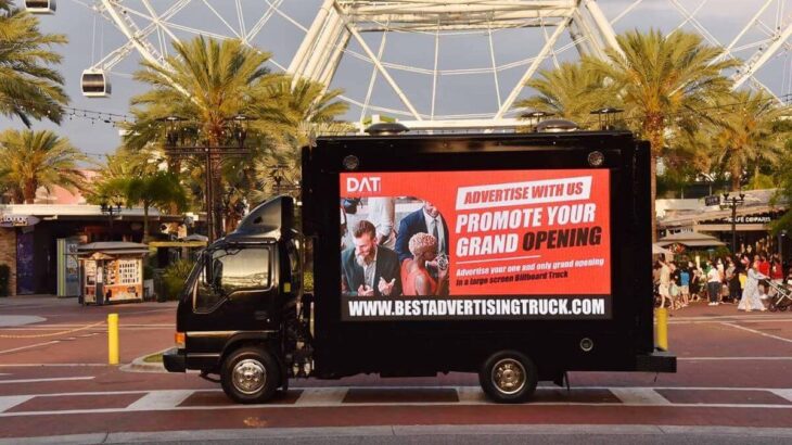 Promote your grand opening on a digital advertising truck